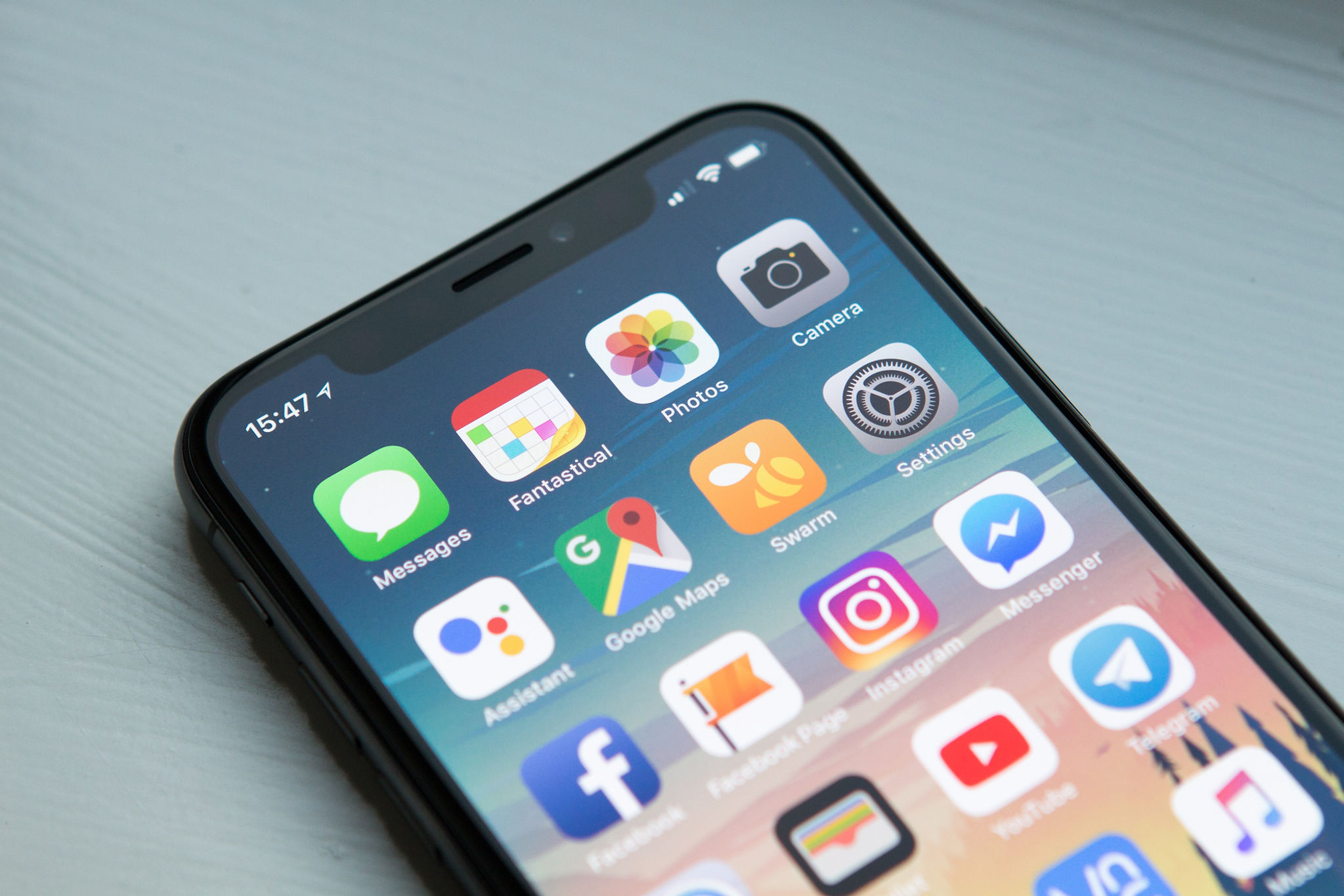 Iphone home screen with different apps.