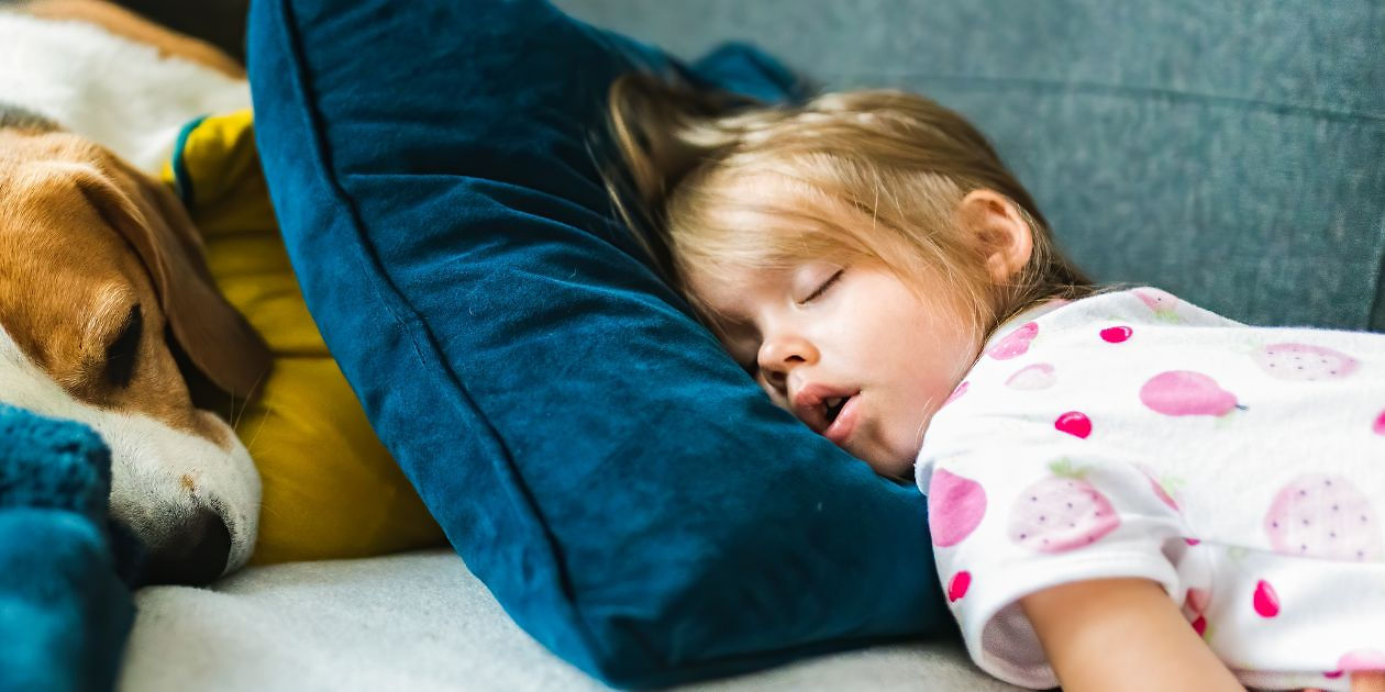 Child snoring and sleeping with sleep apnea